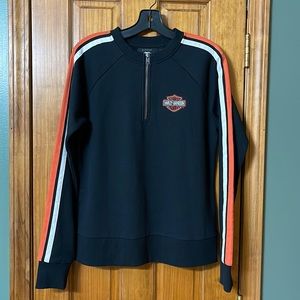 Harley-Davidson woman’s 1/4 zip pullover size medium. Never worn. Excellent cond